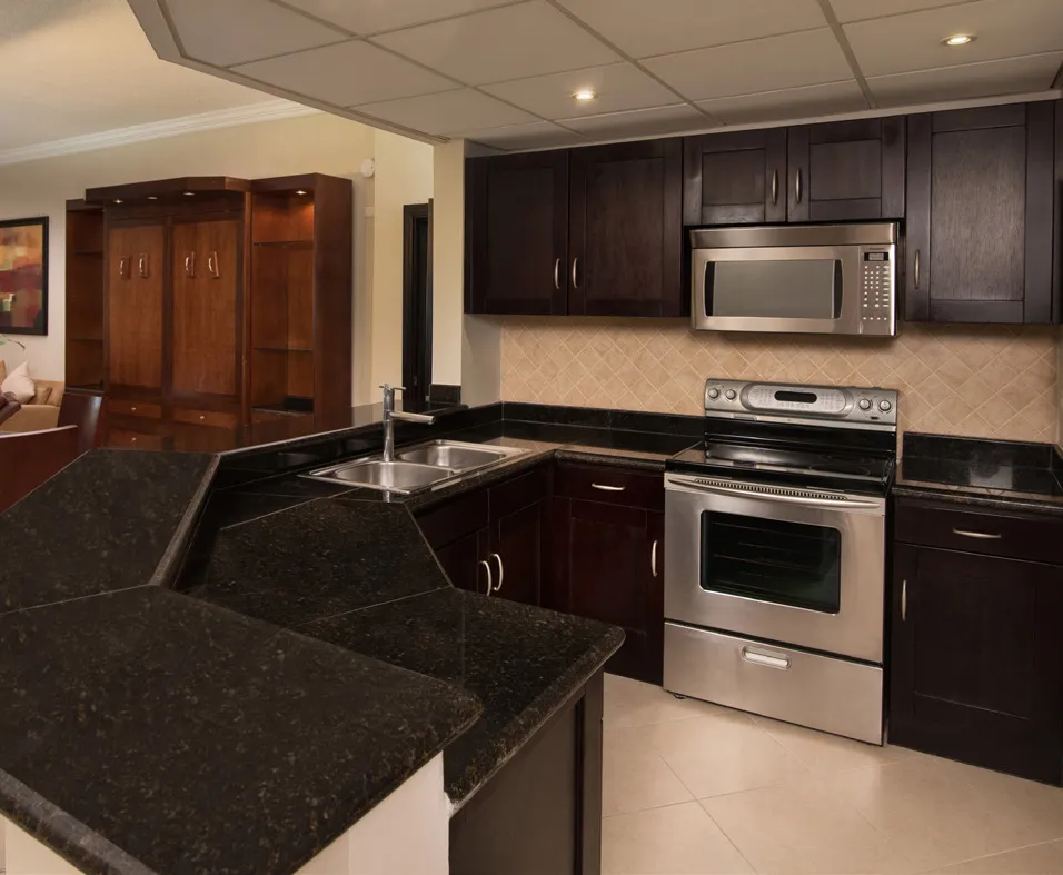 Modern kitchen with dark wood cabinets