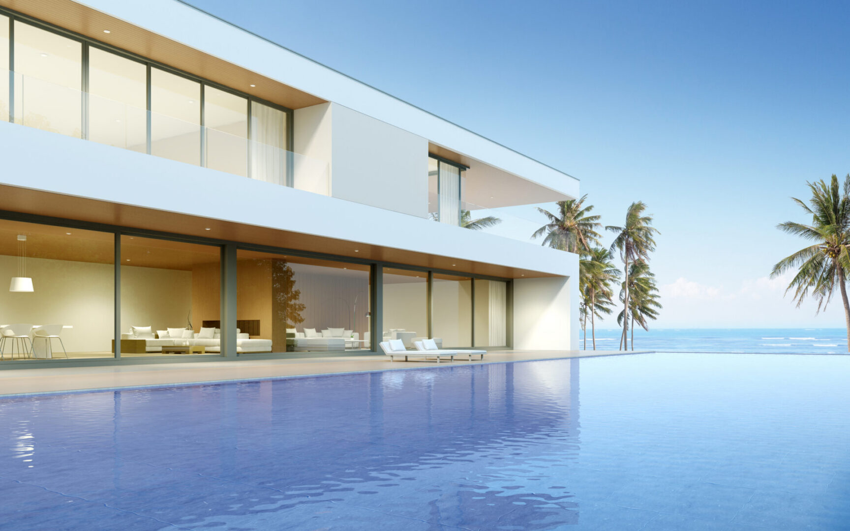 Contemporary home beside serene blue water
