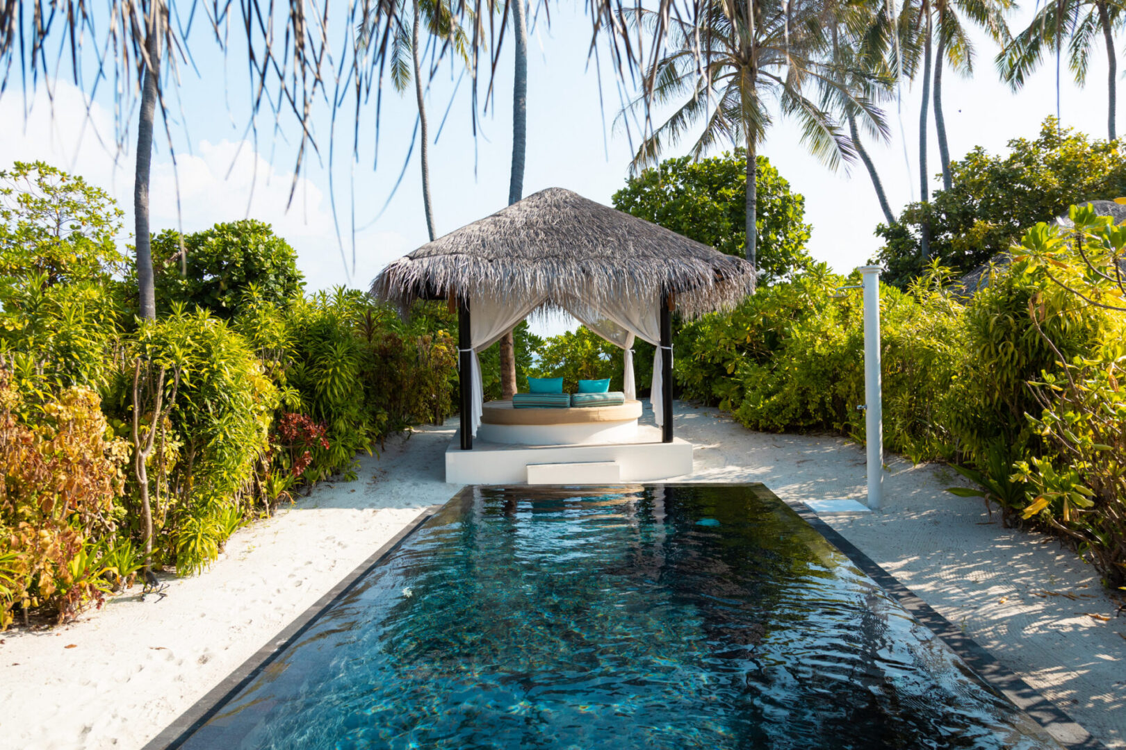 Luxurious cabana by a serene pool
