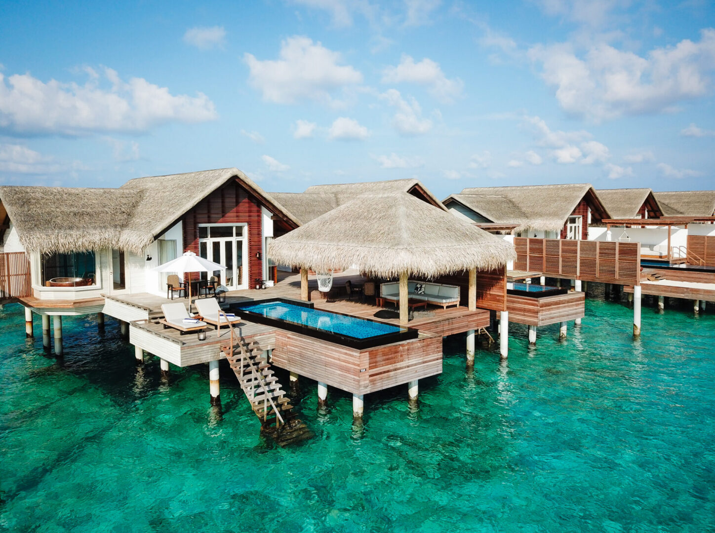 Luxurious villas on turquoise ocean