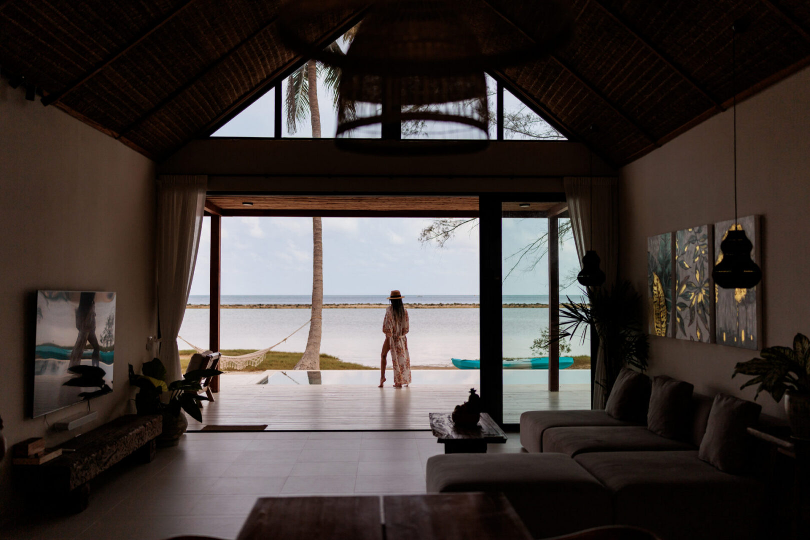 Woman standing by ocean view patio