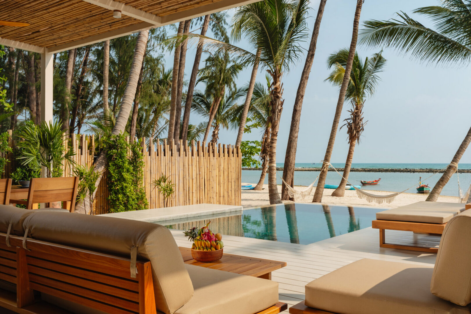 Tropical paradise with loungers and pool