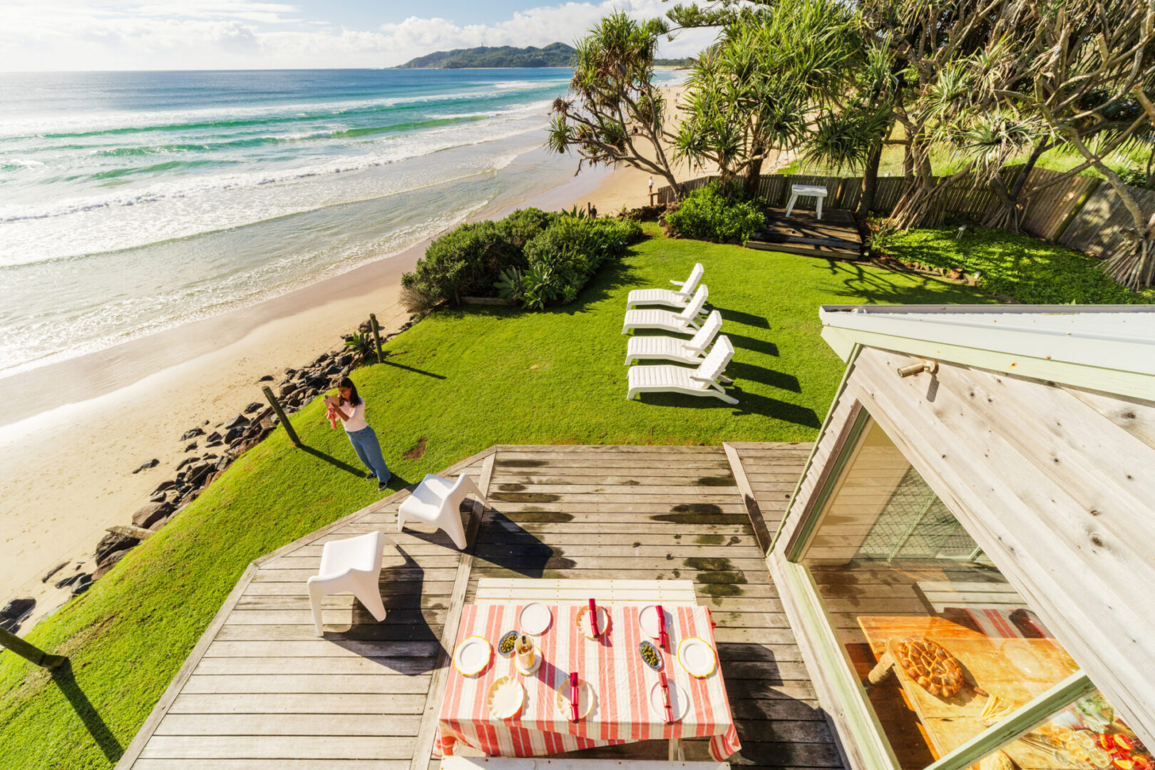 Seaside lawn with picnic and loungers
