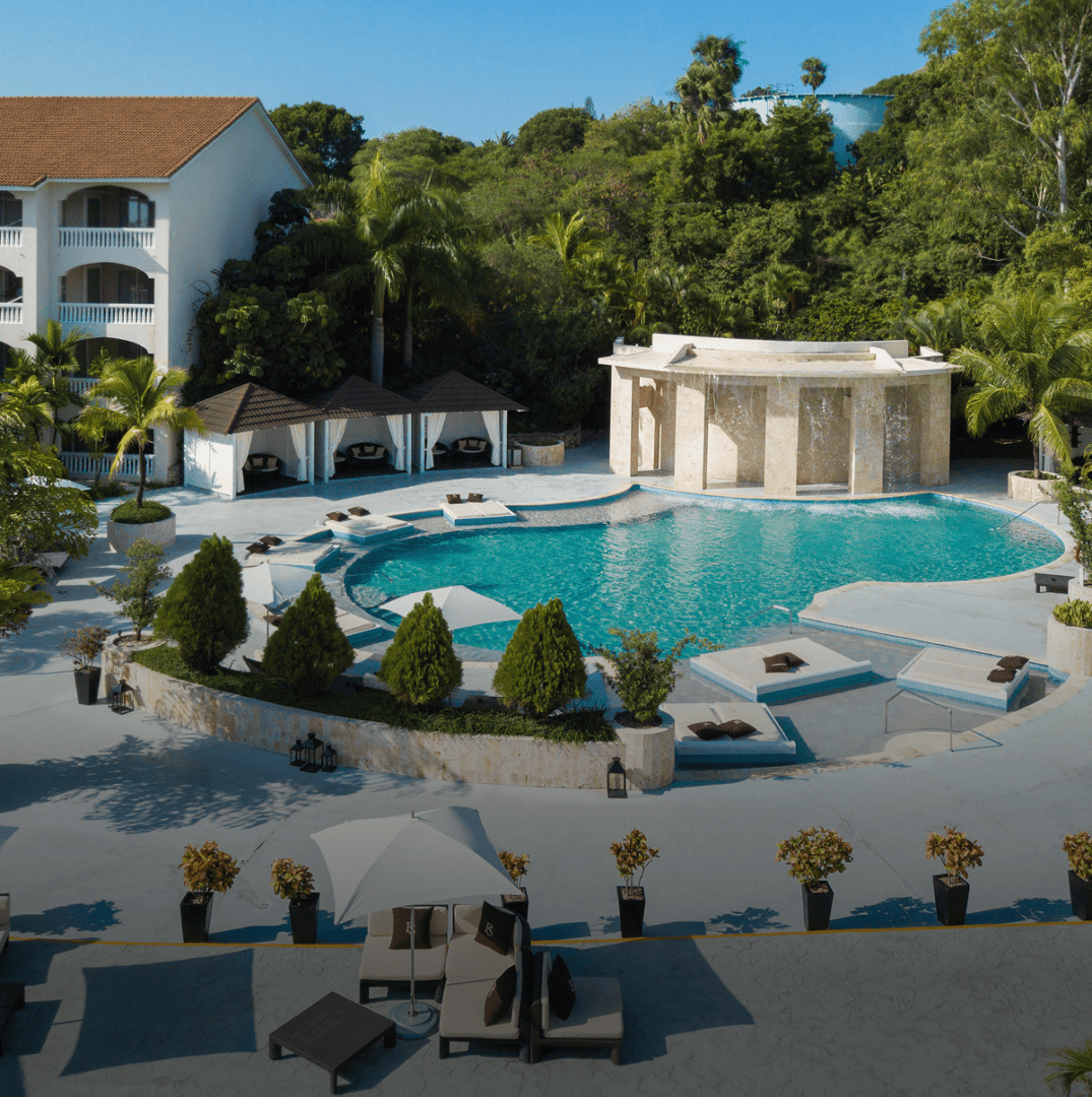 Luxury resort pool with cabanas